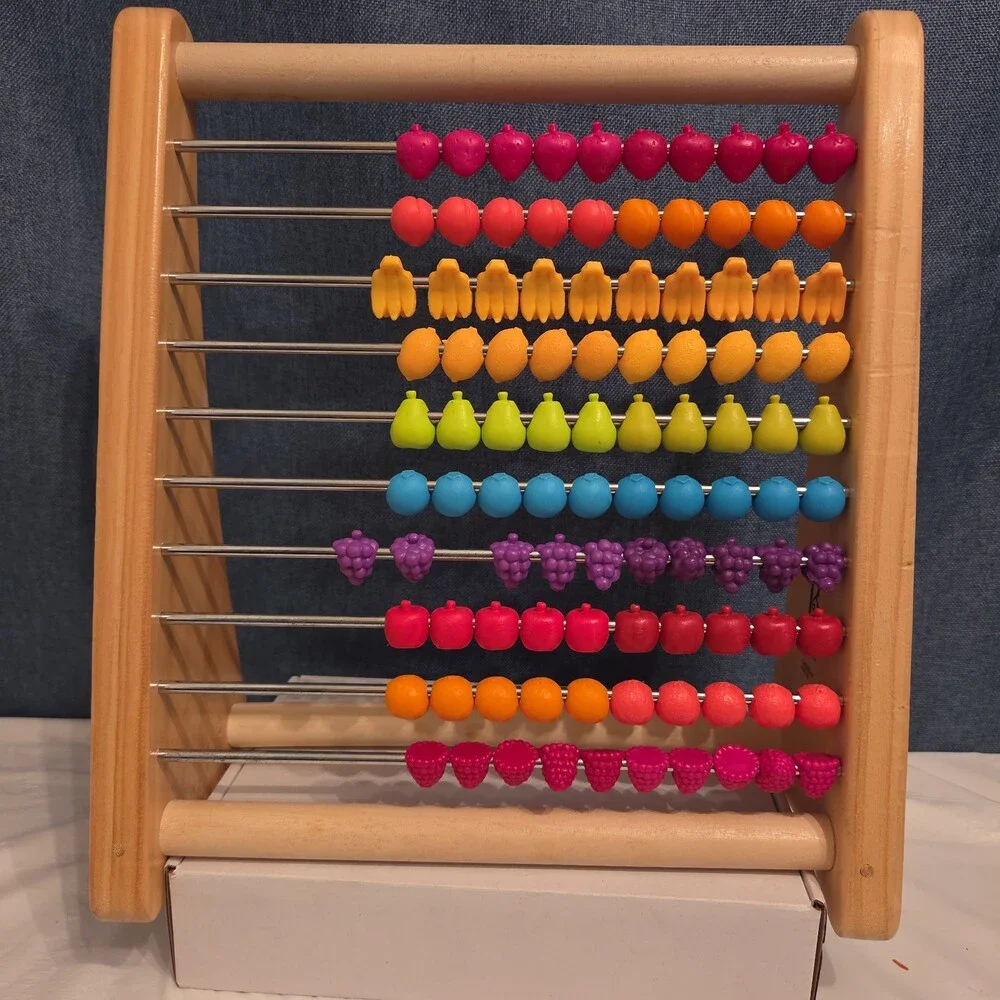 B. Toys Two-Ty Fruity Wooden Abacus Toy Textured Fruit Counting Math Board